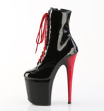 Zweifarbige Stiefelette schwarz Lack mit roter Schnürung, rotem 20 cm hohem Absatz und 10 cm Plateau von Pleaser.